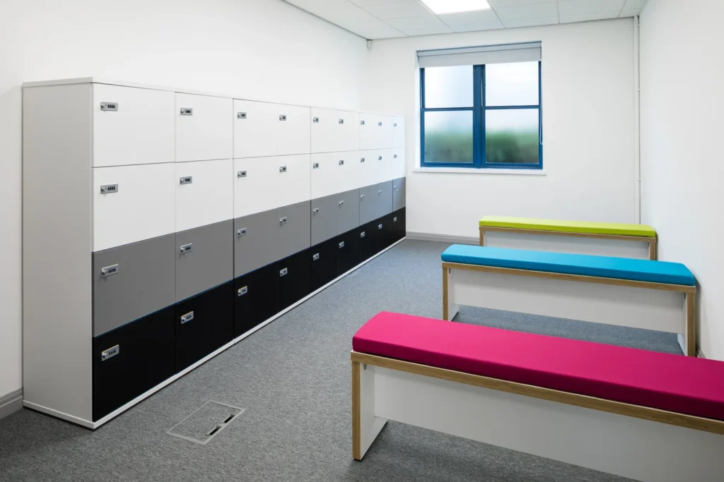 modern office changing room with multi coloured benches